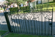 Green gate with scrolls 2